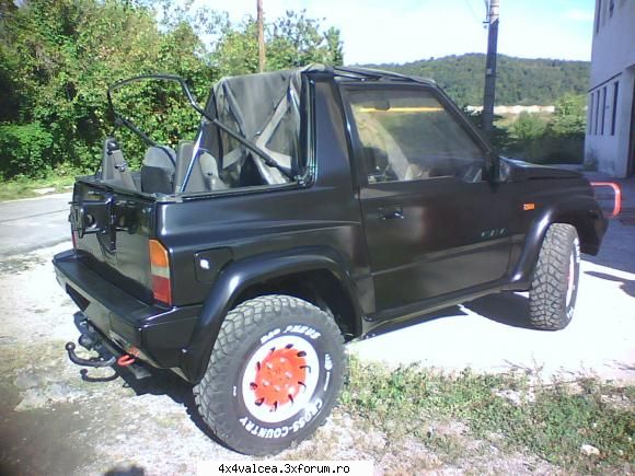 SUZUKY VITARA OFFROAD - am uitat sa va spun ceva culoare???? negru ABANOS - GARAJ